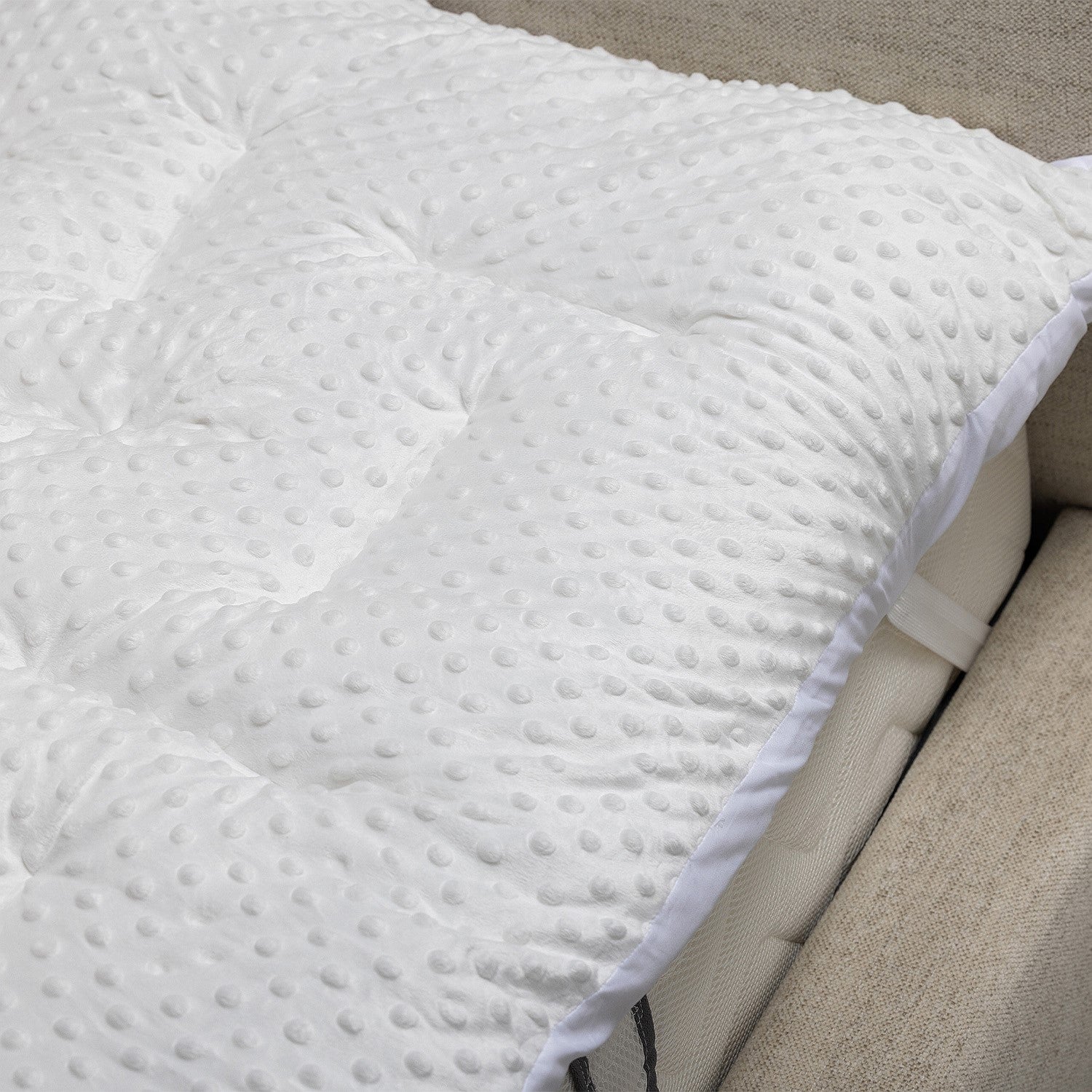 Eden Bobble Mattress Topper 800gsm out on a bed