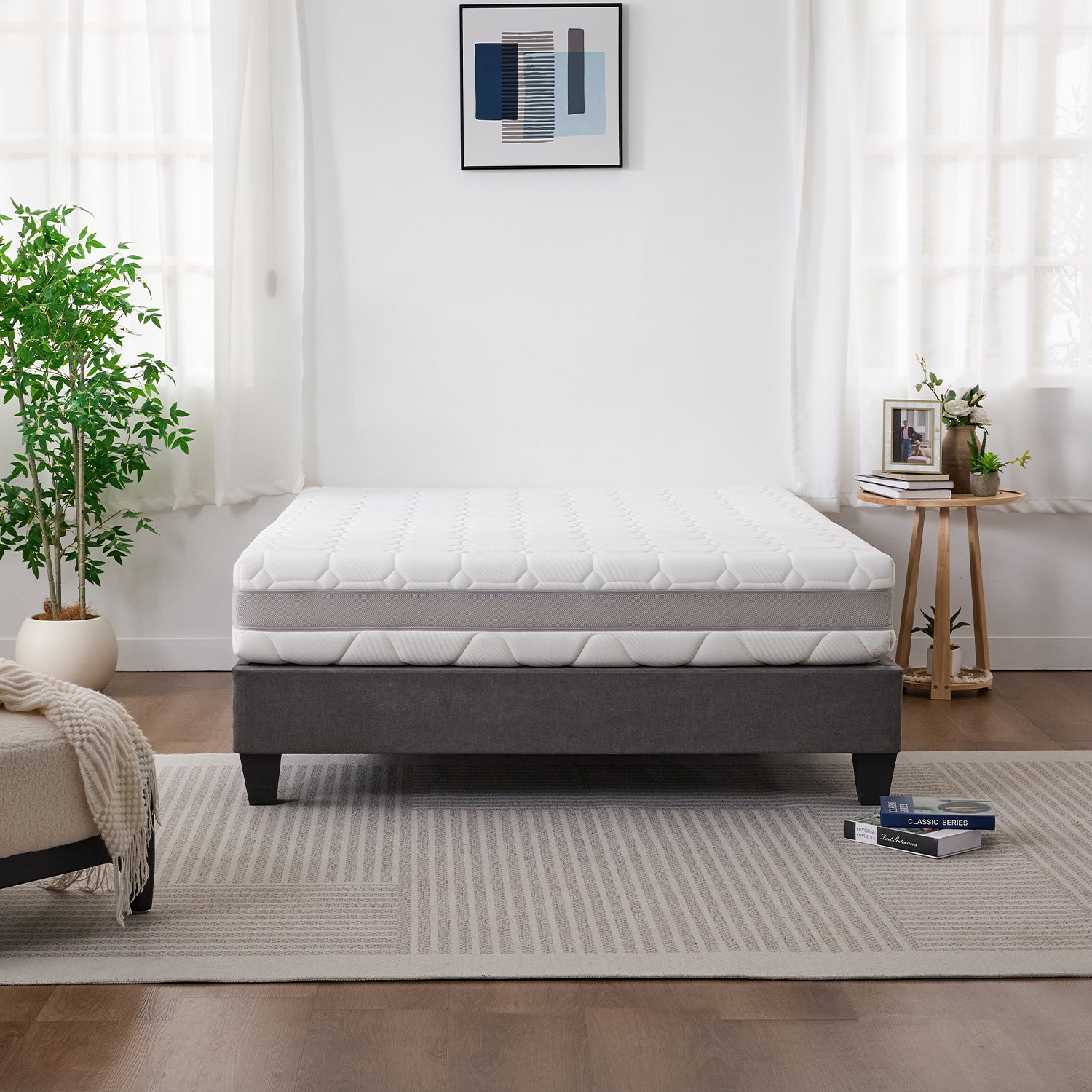 Cloud 9 Dual Side 7-Zone Mattress displayed on a grey bed base in a bright, modern bedroom.