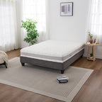 Cloud 9 Dual Side 7-Zone Mattress displayed on a grey bed base in a bright, modern bedroom.