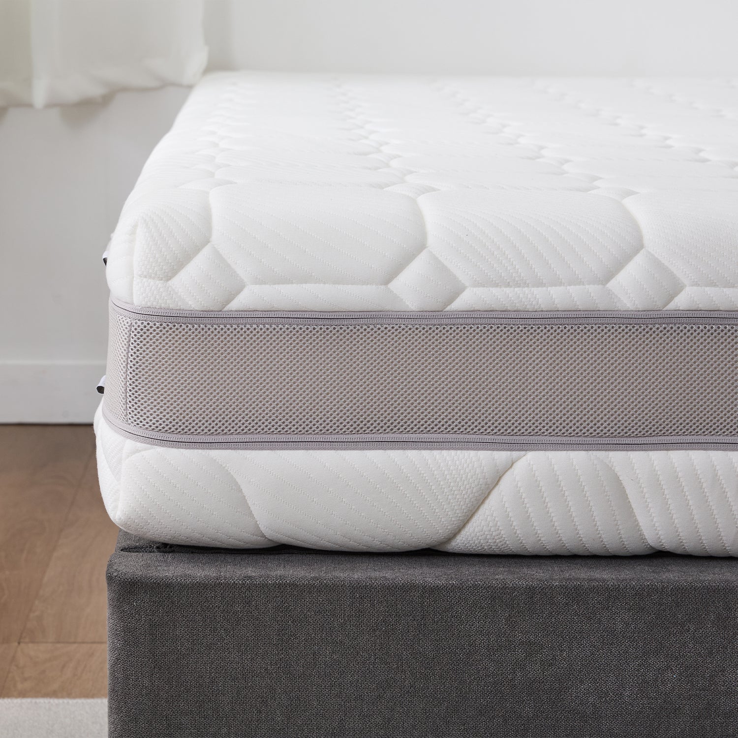 Side profile of the Cloud 9 Dual Side 7-Zone Mattress highlighting the breathable mesh border.