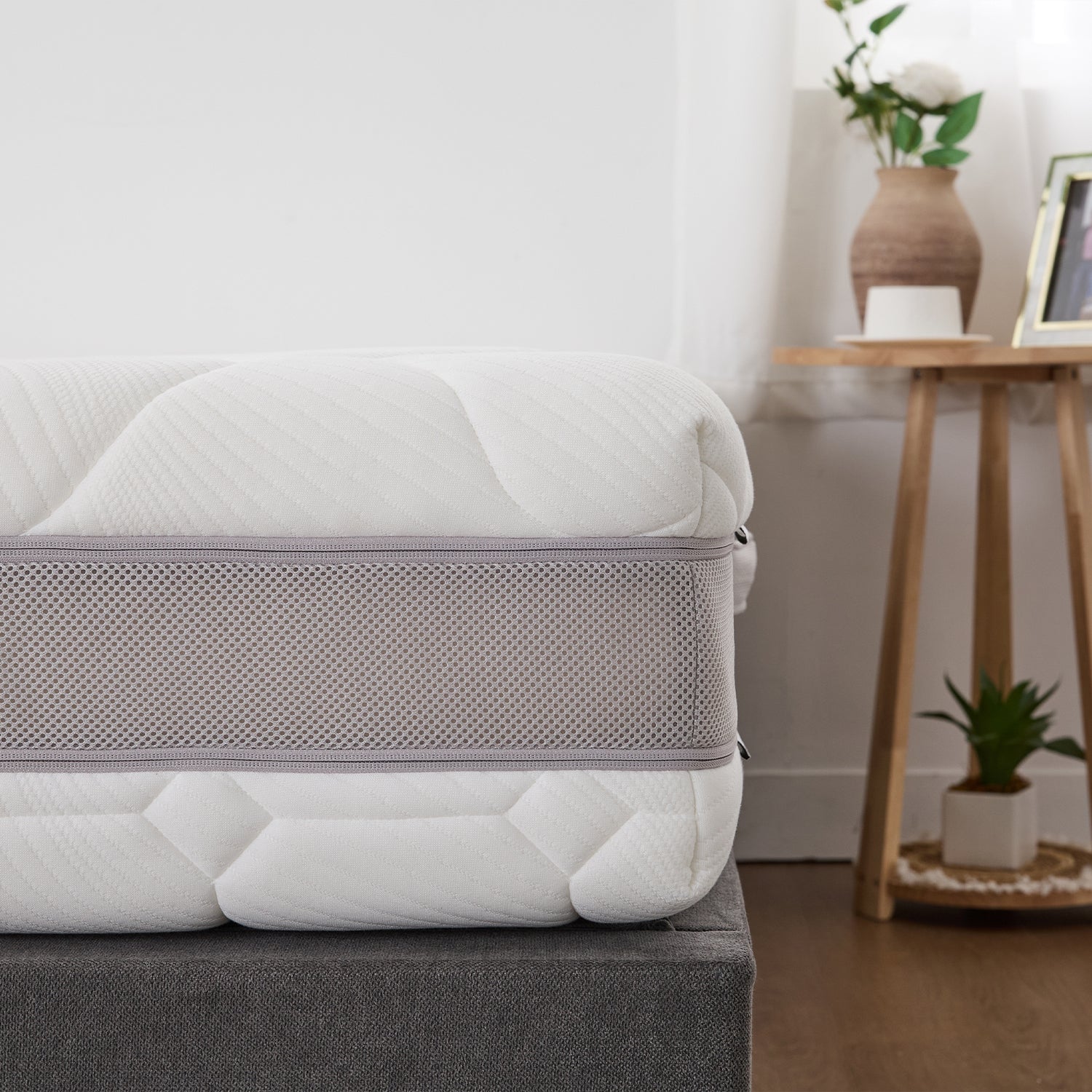 Side profile of the Cloud 9 Dual Side 7-Zone Mattress highlighting the breathable mesh border.