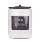 Eden Quilted Memory Foam Mattress Topper in White, packaged in a clear zippered storage bag with carry handle and branded product insert.