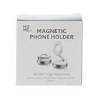 Home Co. Magnetic Phone Holder in White and Silver shown in its retail packaging.