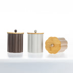 Gather Danni Canisters in Mocha, White and Latte with fluted finishes and bamboo lids, showcasing the removable flower-shaped lid design and coordinating neutral colourways.