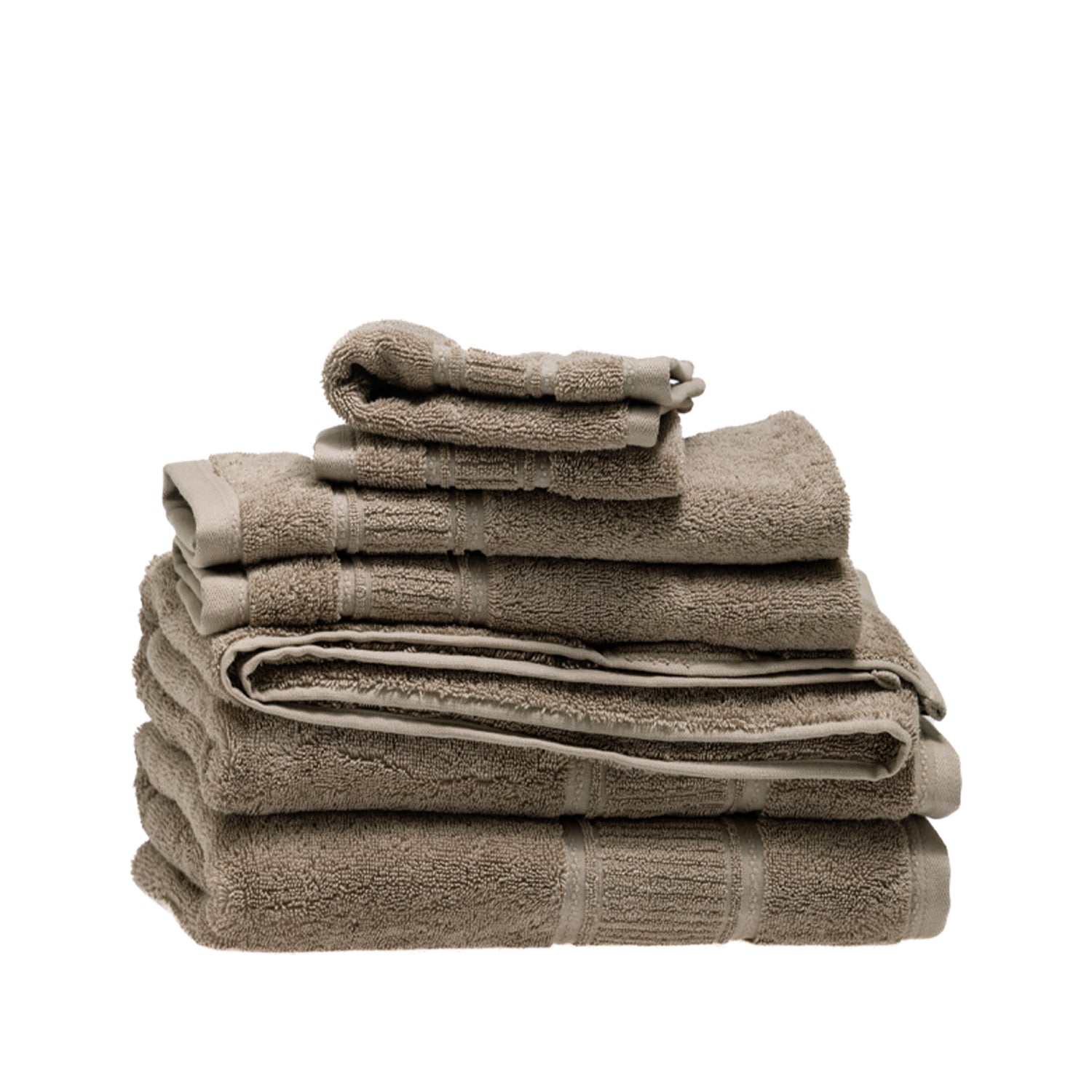 Design Plus Tia Plush 600gsm Towel Pack in beige, with coordinating bath towels, hand towels and face cloths neatly stacked.