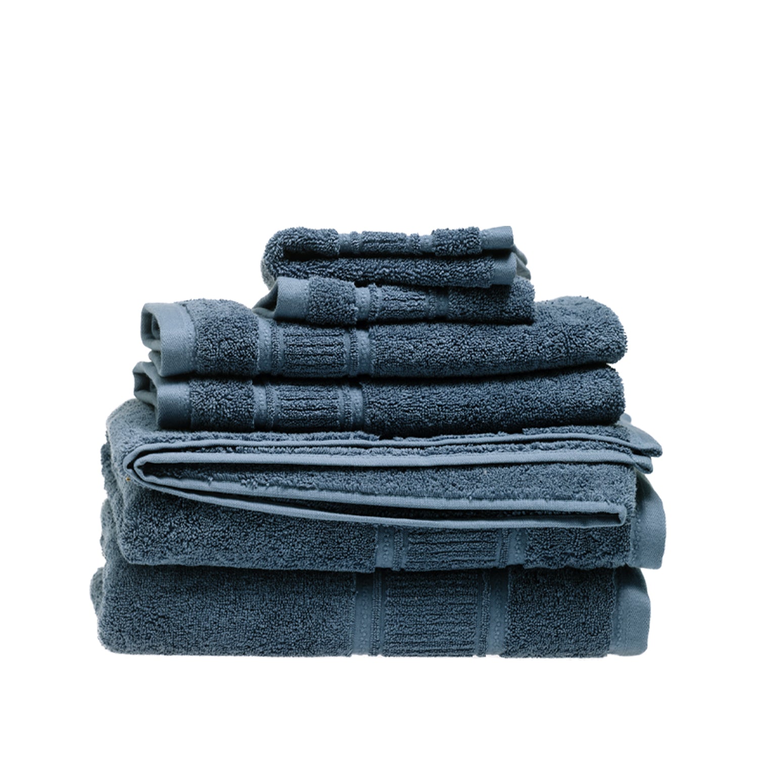 Design Plus Tia Plush 600gsm Towel Pack in petrol, with coordinating bath towels, hand towels and face cloths neatly stacked.