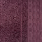 Close-up of the Design Republique Elani Mulberry bath towel, showcasing the soft cotton pile and textured ribbed border detail.