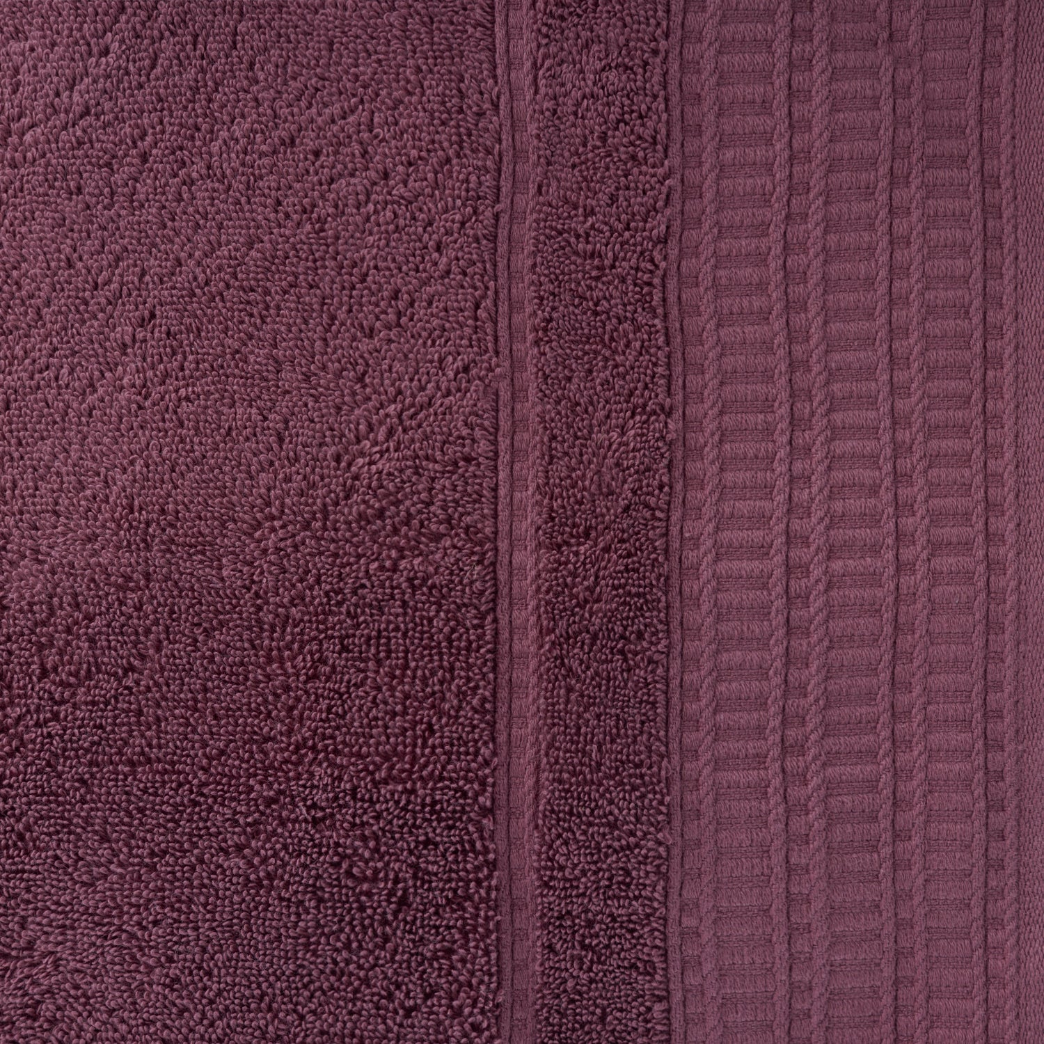 Close-up of the Design Republique Elani Mulberry bath towel, showcasing the soft cotton pile and textured ribbed border detail.