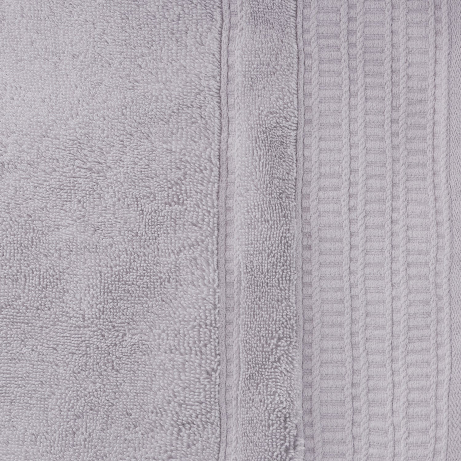 Close-up of the Design Republique Elani Silver hand towel, showing the soft terry texture and ribbed border detail.