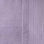 Close-up of the Design Republique Elani Lavender face cloth, showing the soft terry texture and ribbed border detail.