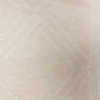 Close-up of the Design Republique Gemma Plush 550gsm bath sheet in ivory, showing its soft terry texture and geometric detailing.