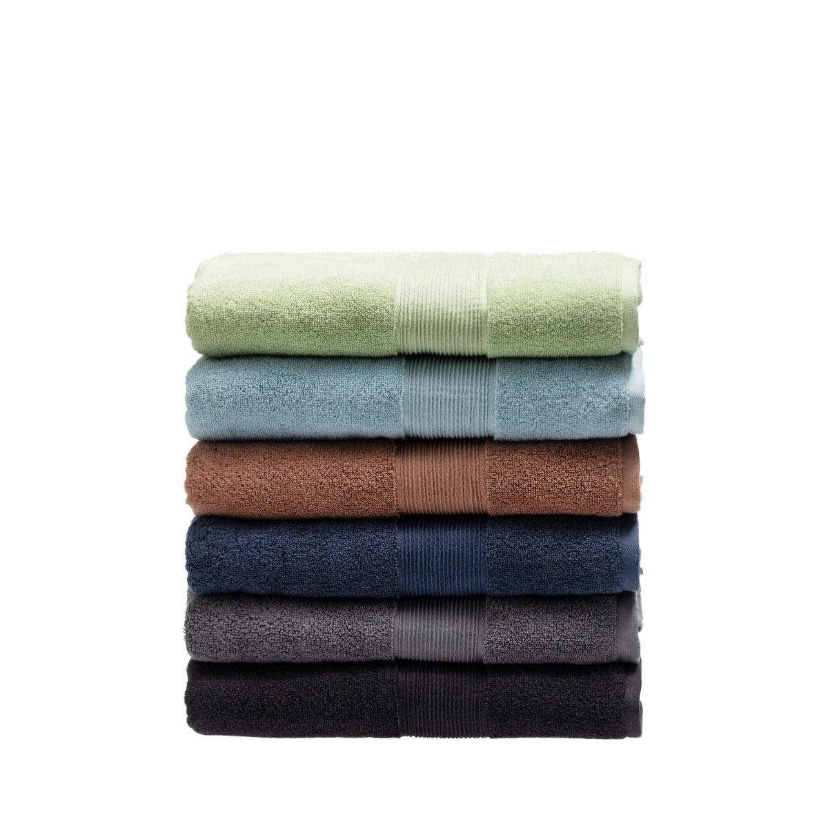 Stack of six folded plush bath towels in French pear, sky blue, brick, navy, smoke and black.