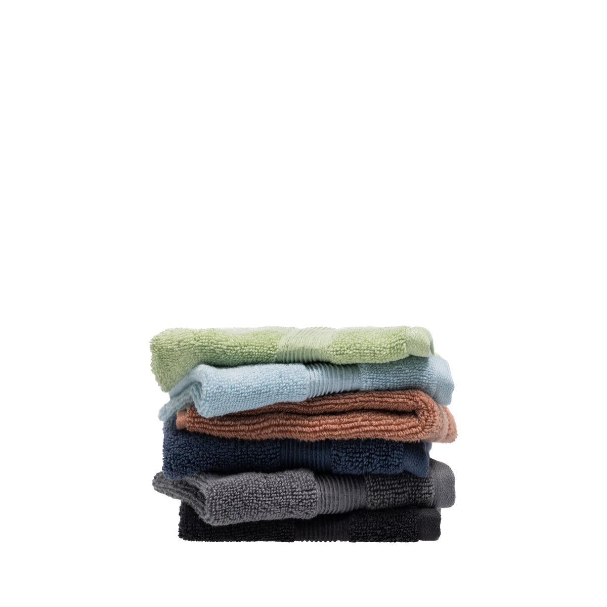 Stack of six Fieldcrest Amelie plush face cloths in French pear, sky blue, brick, navy, smoke and black, featuring soft cotton texture and ribbed border detailing.