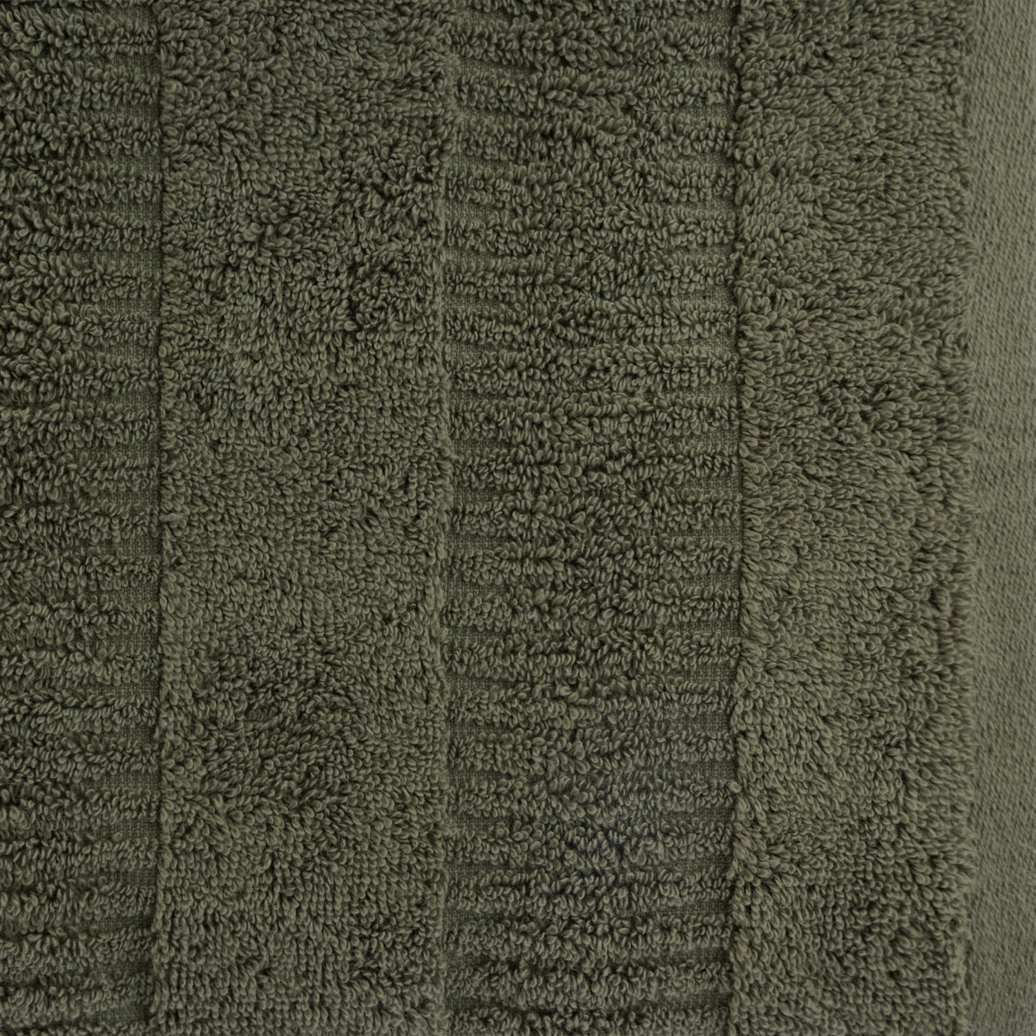 Close-up of a khaki Design Republique Addison textured bath sheet showing the plush cotton texture and contemporary stripe design.