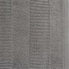 Close-up of a silver Design Republique Addison textured bath sheet showing the soft looped cotton pile and raised stripe detailing.