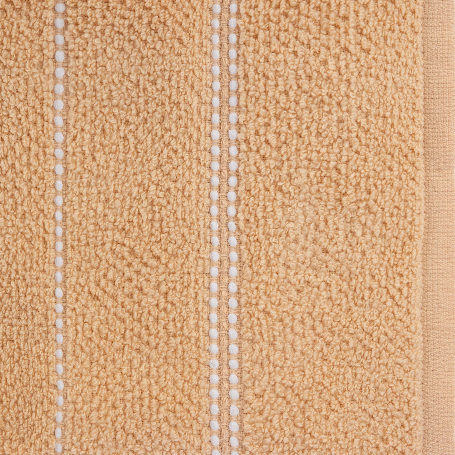 Home Co. Sara Stitch Hand Towel in Peach, featuring a soft textured finish with white stitched stripe detailing.