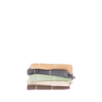 Home Co. Sara Stitch Face Cloths stacked in peach, charcoal, sage green, cream and mocha with white stitched stripe detailing.