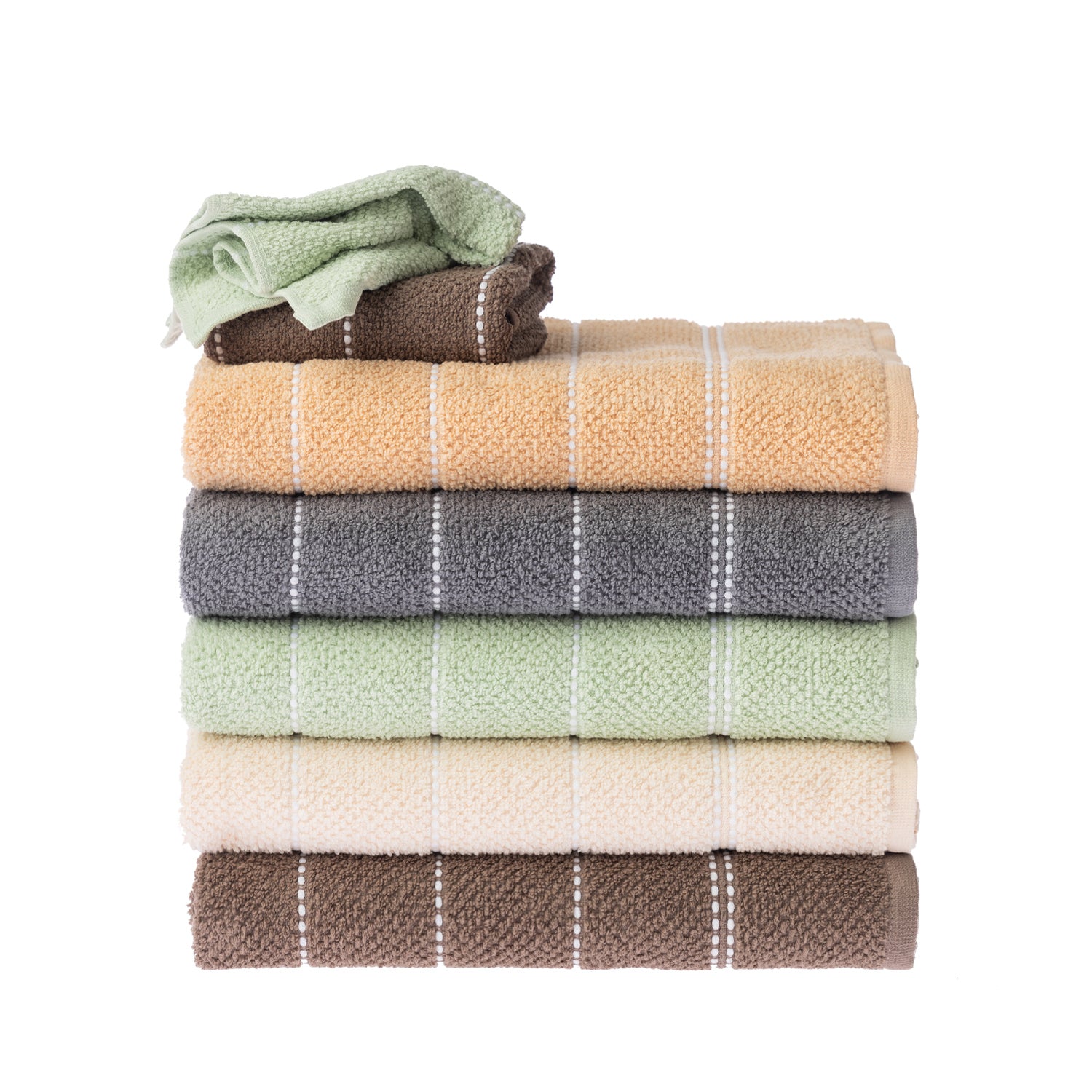 Home Co. Sara Stitch towel range displayed in a stacked arrangement of peach, charcoal, sage green, cream and mocha, with coordinating smaller towels placed on top.