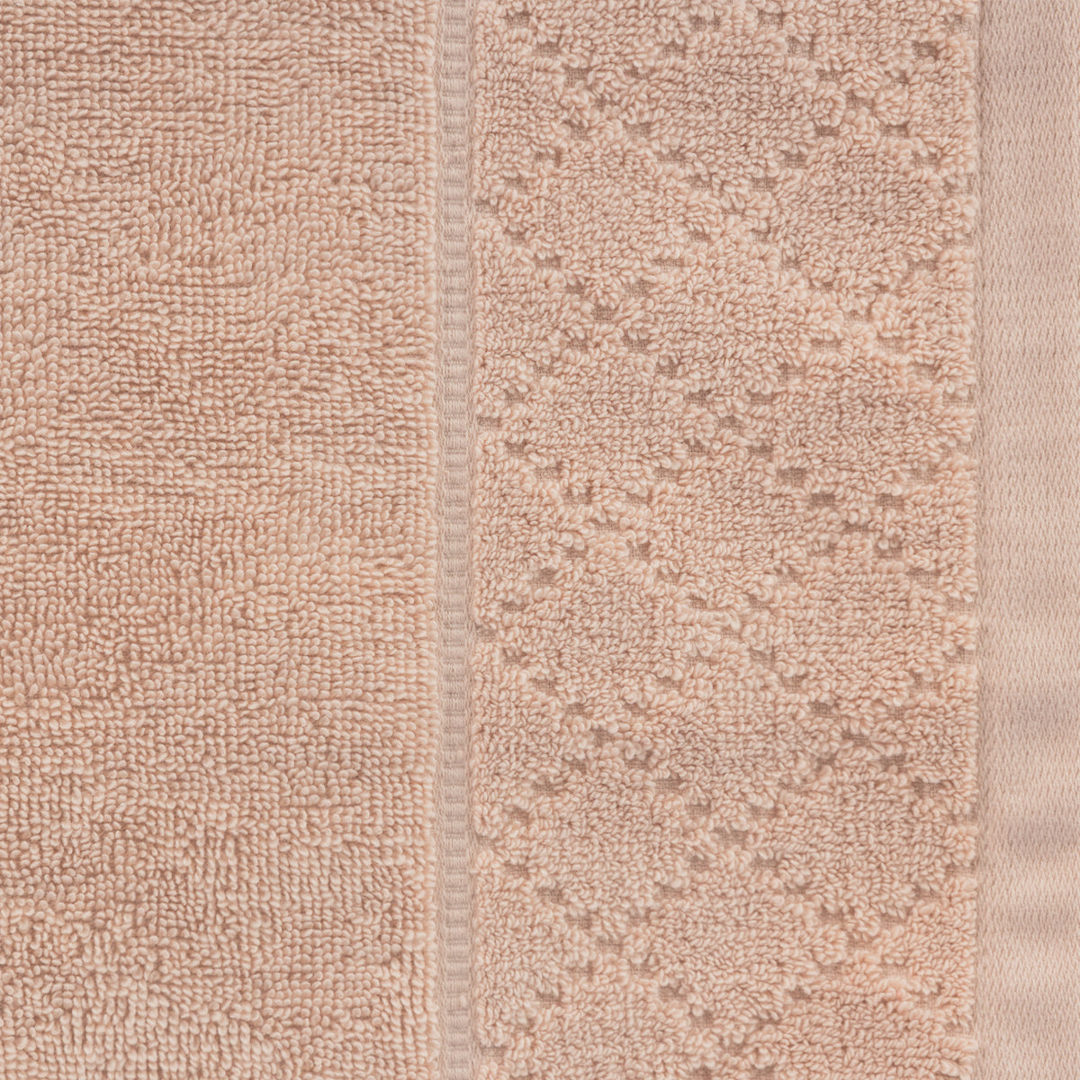 Close-up of the Gracious Living Marilyn Bath Sheet in rose, showing the soft cotton loop texture and decorative woven border.