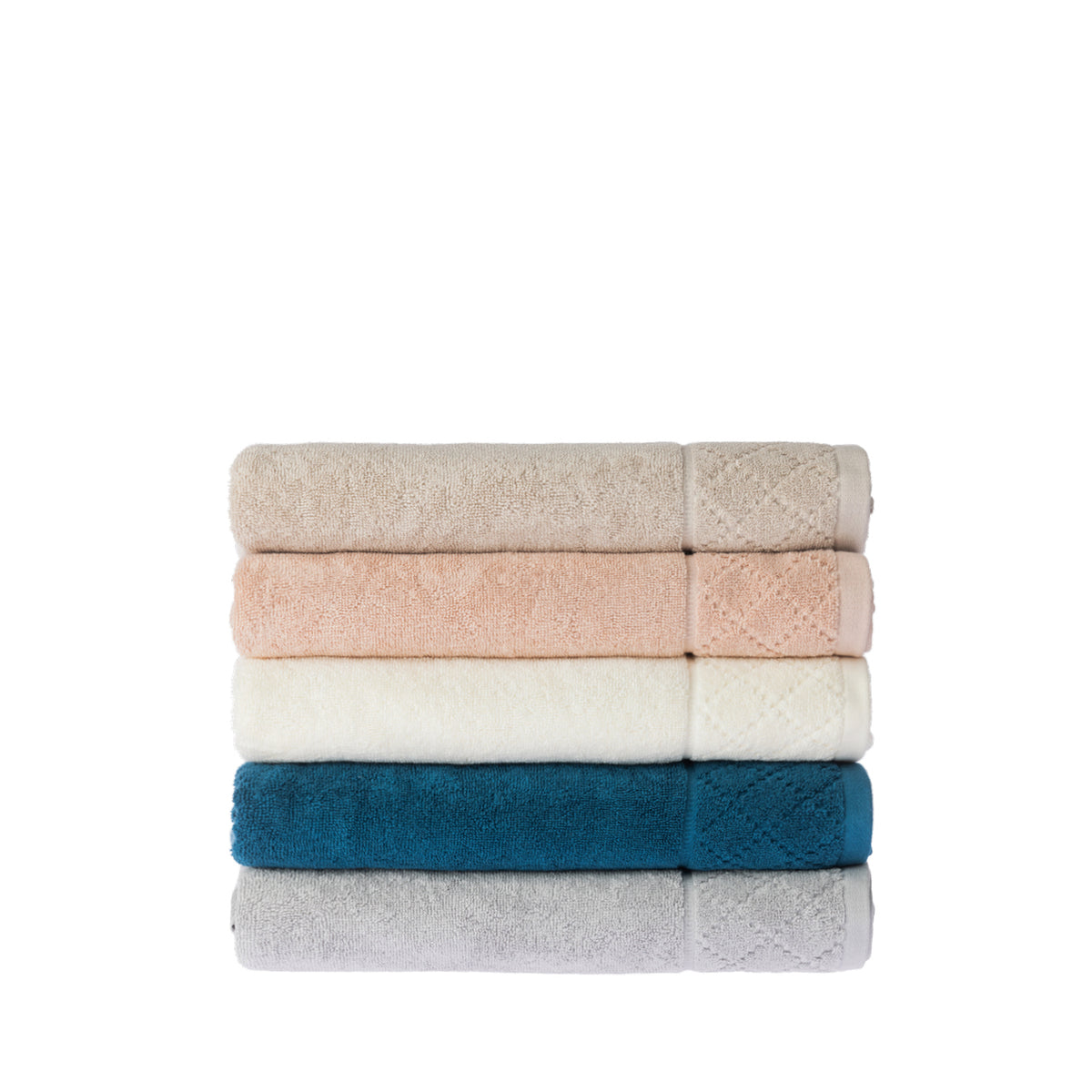 Stack of five Gracious Living Marilyn bath towels in beige, peach, white, teal and silver, neatly folded to display the soft cotton texture and patterned borders.