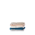 Stack of Gracious Living Marilyn face cloths in beige, peach, white, teal and silver, showing the soft textured cotton finish and coordinating design.