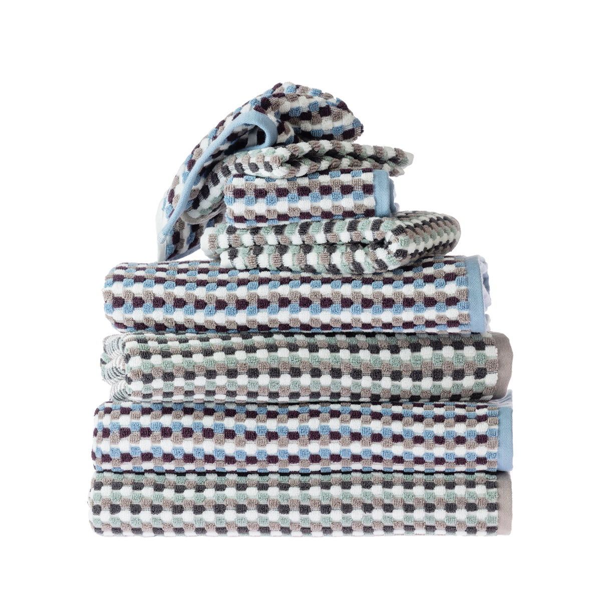 Assorted Quinny Popcorn towels stacked in coordinating patterned Berry and Taupe colourways, featuring a multicoloured raised check design.