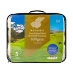 Woolrest New Zealand Wool Reversible Underlay 600gsm in clear storage bag with handle.