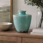 Gracious Living Candia Terracotta Vase in seafoam, styled on a wooden console with a soft glazed finish.