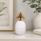 Design Republique Pippa Pineapple Décor Piece in white, styled on a tabletop with a gold pineapple top and textured body.