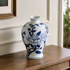 Gracious Living Magnolia Vase Blue White styled on a wooden sideboard.
