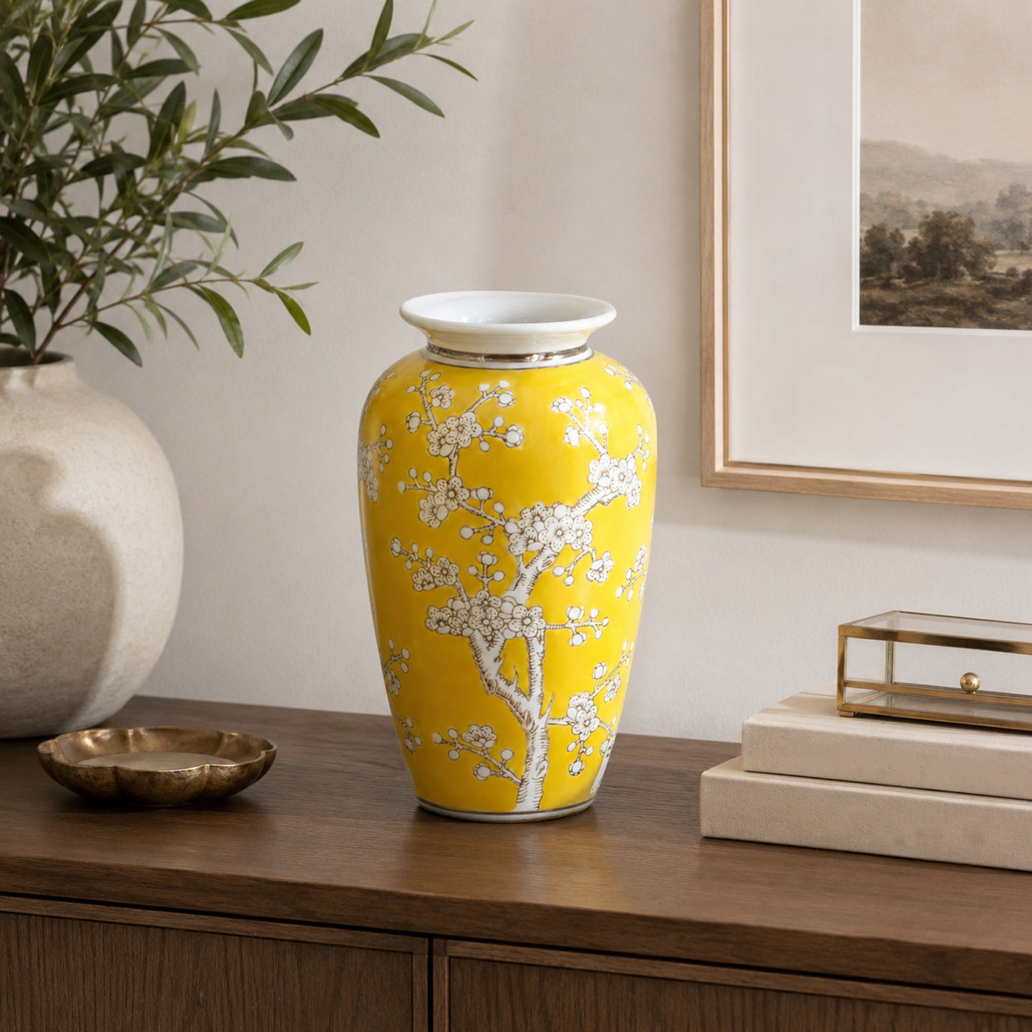 Gracious Living Yellow Plum Blossom Urn Vase Yellow styled on a wooden sideboard.