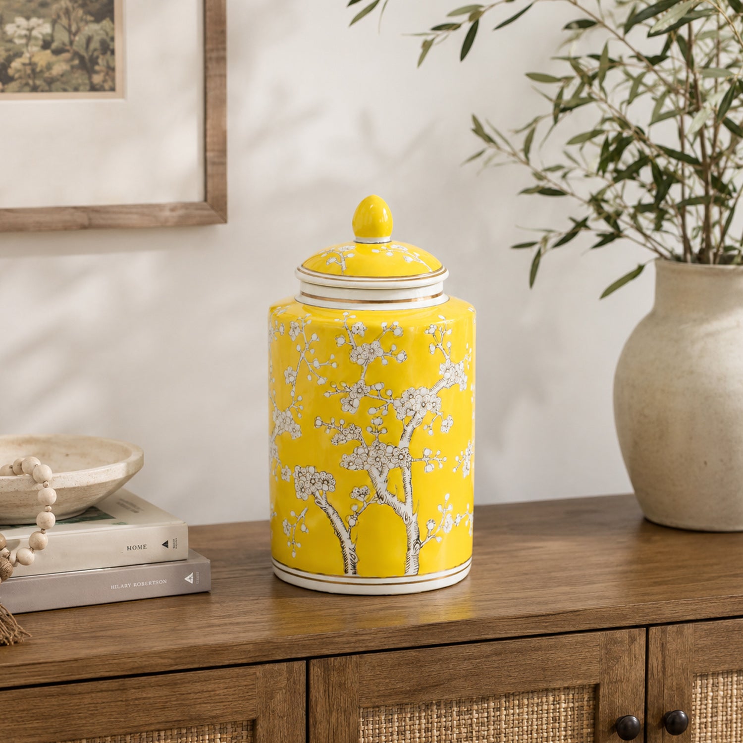Gracious Living Yellow Plum Blossom Jar Yellow styled on a wooden sideboard.