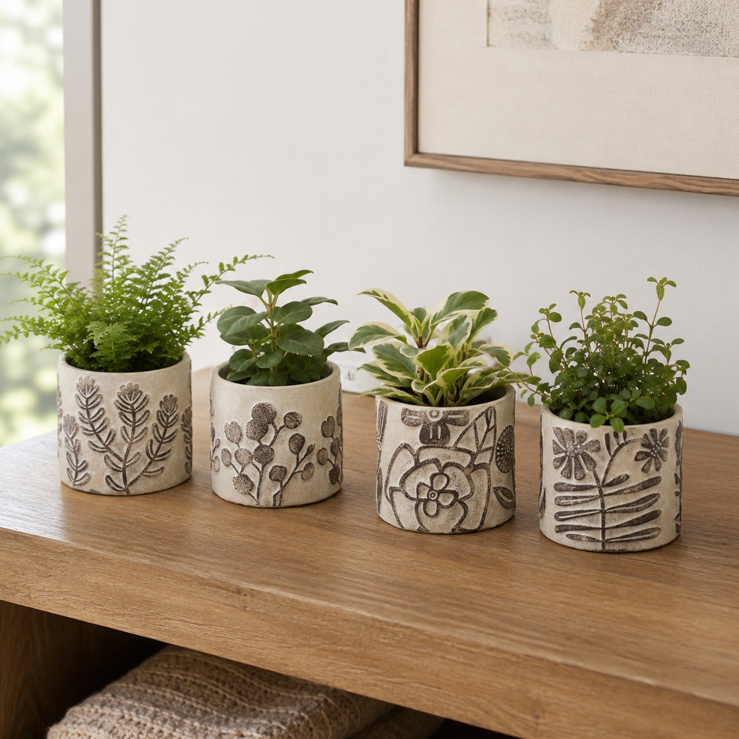 Design Republique Herb Planter 4 Piece Natural set styled with small plants on a wooden sideboard.