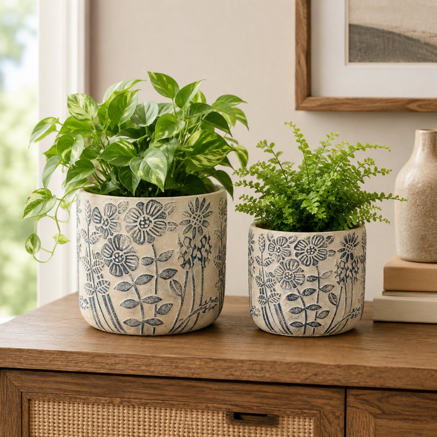 Design Republique Renee Planter Set of 2 Green styled on a wooden sideboard with plants.