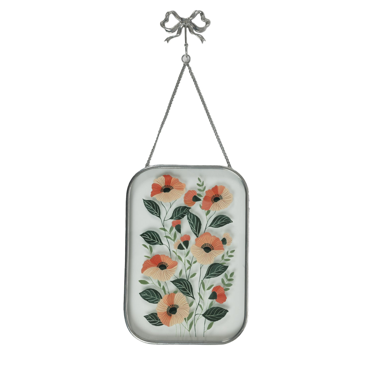 Silver framed glass wall art with orange floral artwork and bow hanging hook on a white background.