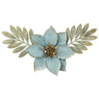 Light blue floral metal wall art with gold detailing and green leaves on a white background.