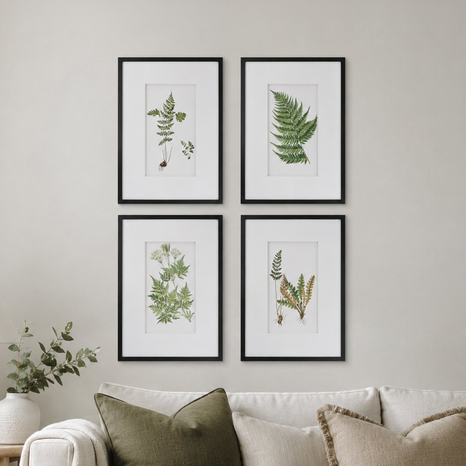 Gracious Living Botanical Black & White Fern Art 4 Piece in a styled living room setting above a neutral sofa.