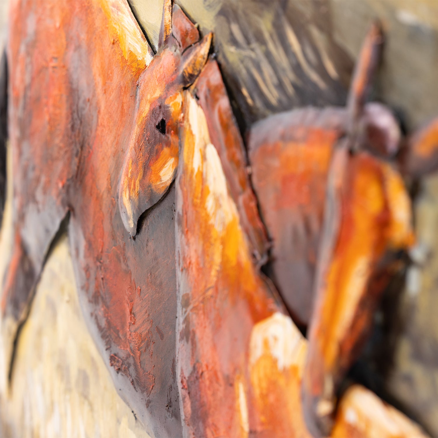 Close-up of the horses wall art showing the raised metal construction, textured brushwork and layered detailing.