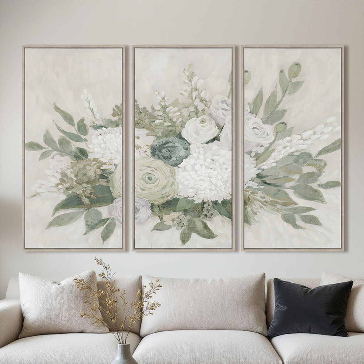 Lifestyle image showing the Gracious Living Still Life Framed Canvas 3 Piece displayed together above a neutral sofa.
