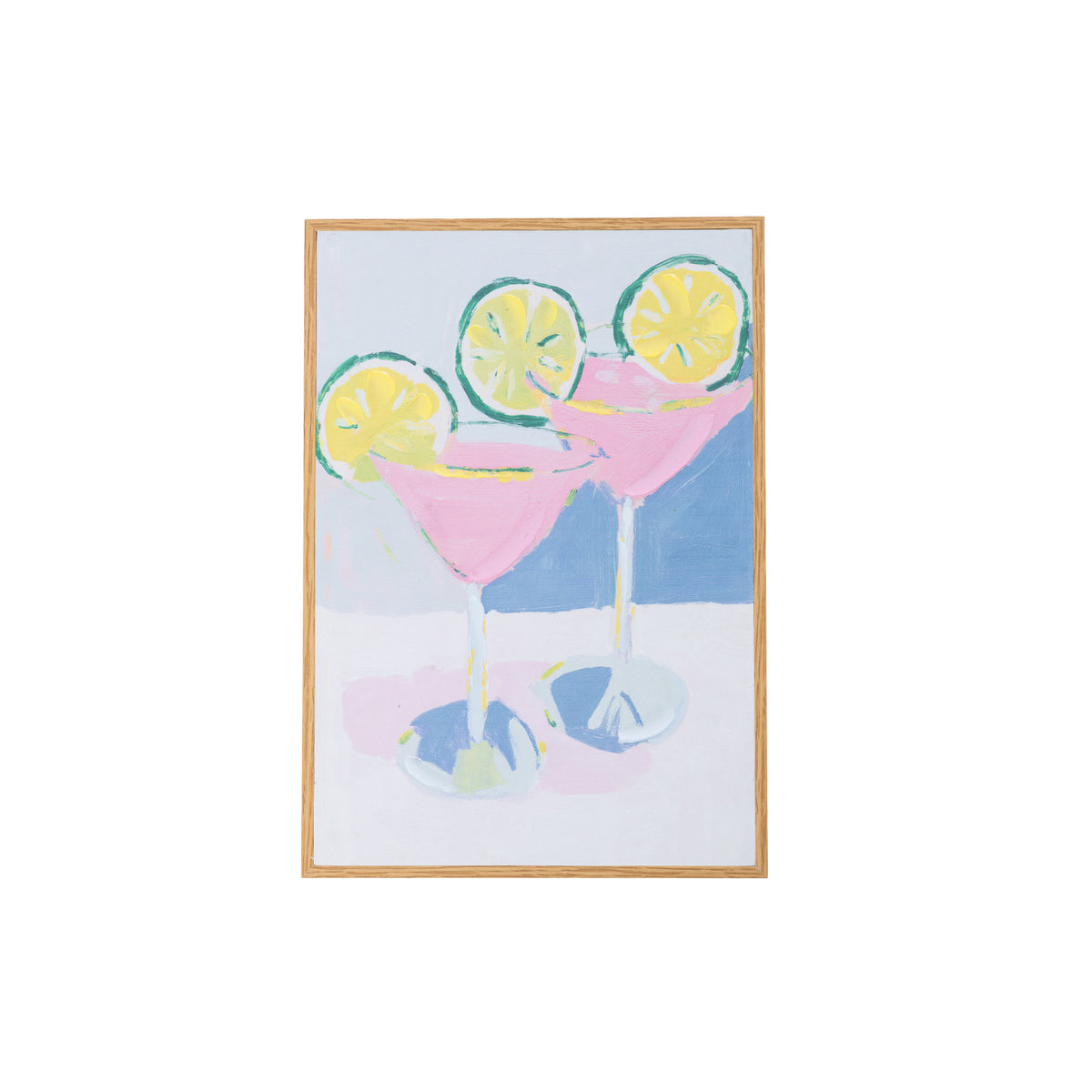 A framed art print featuring a colorful illustration of two pink martini glasses with lemon slices on a light background, set against a plain white backdrop.