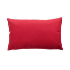An outdoor breakfast cushion reverse featuring a plain red hue, shown against a plain white studio backdrop.