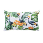 An outdoor breakfast cushion featuring a vibrant tropical bird, floral and palm leaf print on a light background, isolated on a white studio background.
