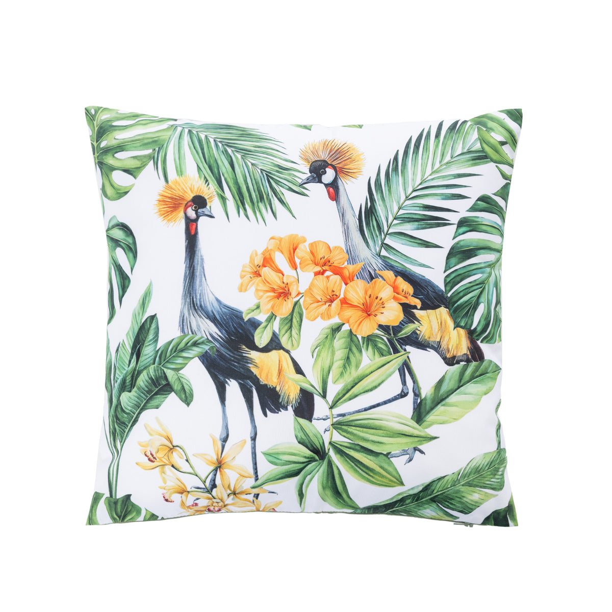An outdoor cushion featuring a tropical print of two crowned cranes surrounded by green palm and monstera leaves and bright orange flowers on a white background.