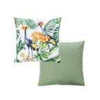 An outdoor cushion front and reverse features a tropical print with green palm leaves, orange flowers, and two crowned cranes on a white base.And a plain green reverse.