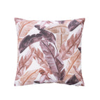 An outdoor cushion featuring a tropical banana leaf pattern in muted shades of brown, dusty rose, and beige on a white background.