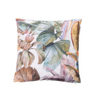 An outdoor cushion featuring a tropical leaf pattern on a white background.