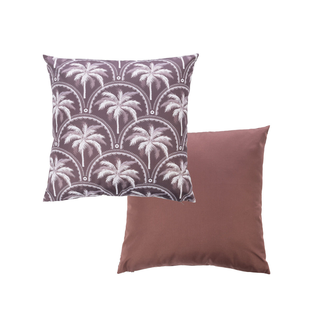 An outdoor cushion features a palm tree pattern in white & mocha while the reverse is a solid mocha color.