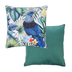 An outdoor euro cushion featuring a detailed print of a Tui bird surrounded by tropical leaves & flowers on a light background, while the reverse of the cushion shows a solid green fabric.