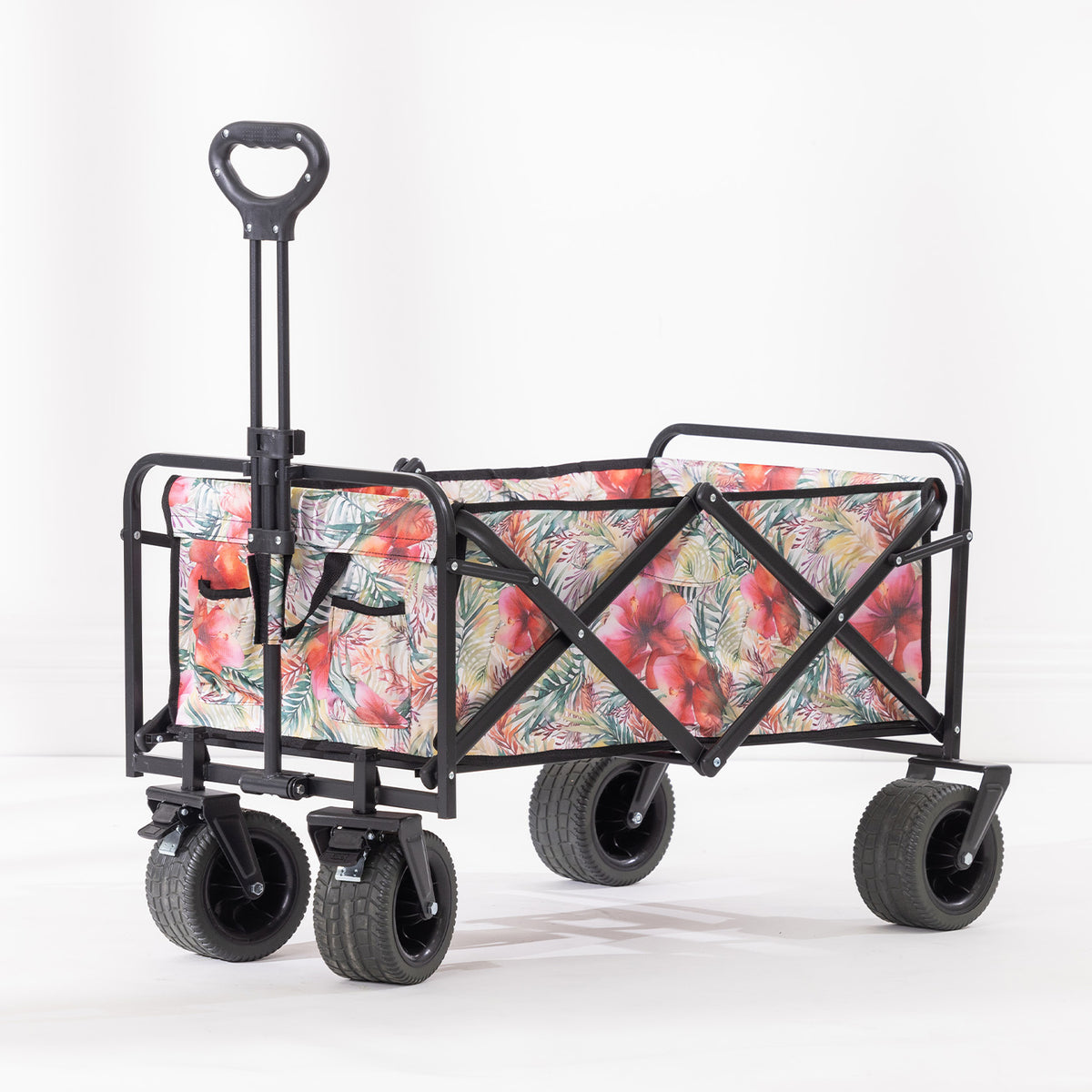 Hibiscus-print beach trolley with black metal frame, four wide wheels and an extended pull handle.