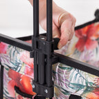 Close-up showing the adjustable pull handle mechanism on the beach trolley.